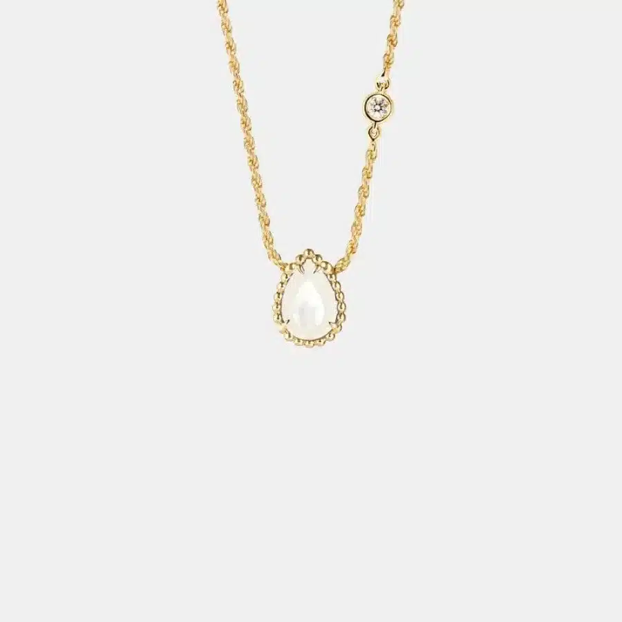 Pendentif Serpent Bohème Boucheron en or jaune, perle 0.75ct, motif xs — photographie du modèle, cote d’occasion GOLDMARKET