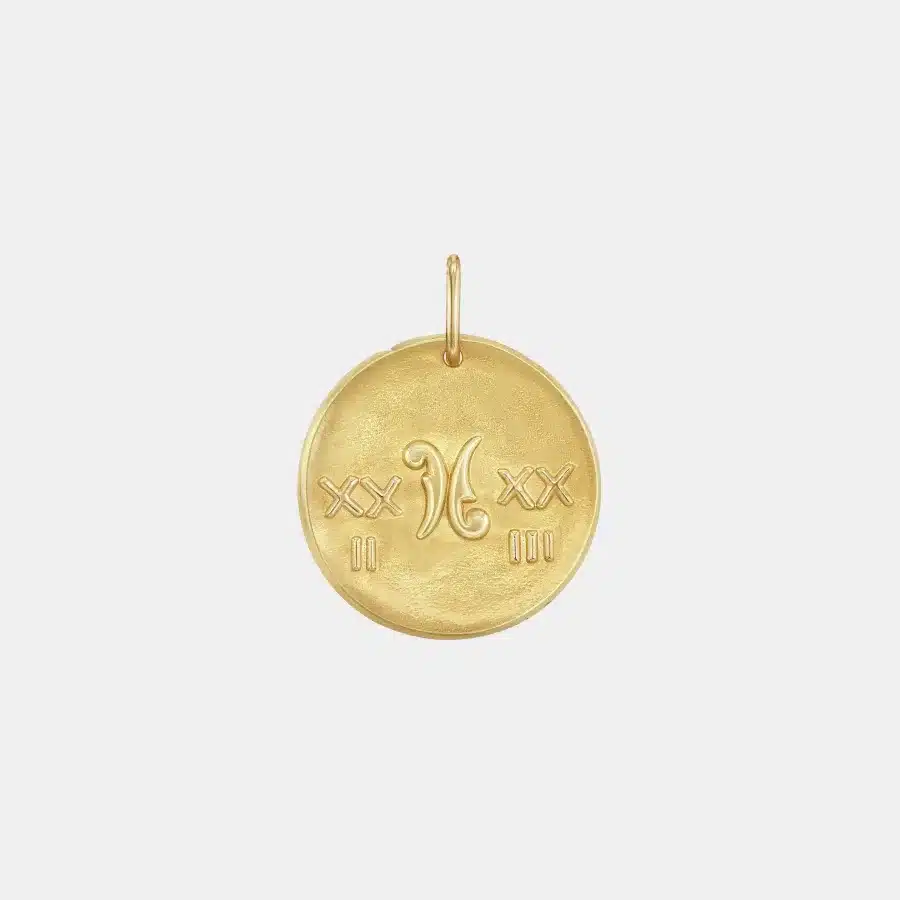 Pendentif Zodiaque Van Cleef & Arpels en or jaune, pisces — photographie du modèle, cote d’occasion GOLDMARKET